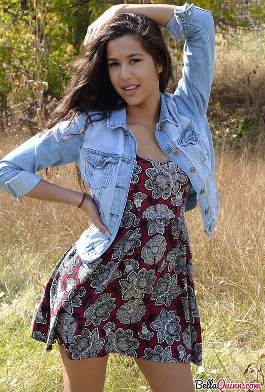 Bella poses in the field